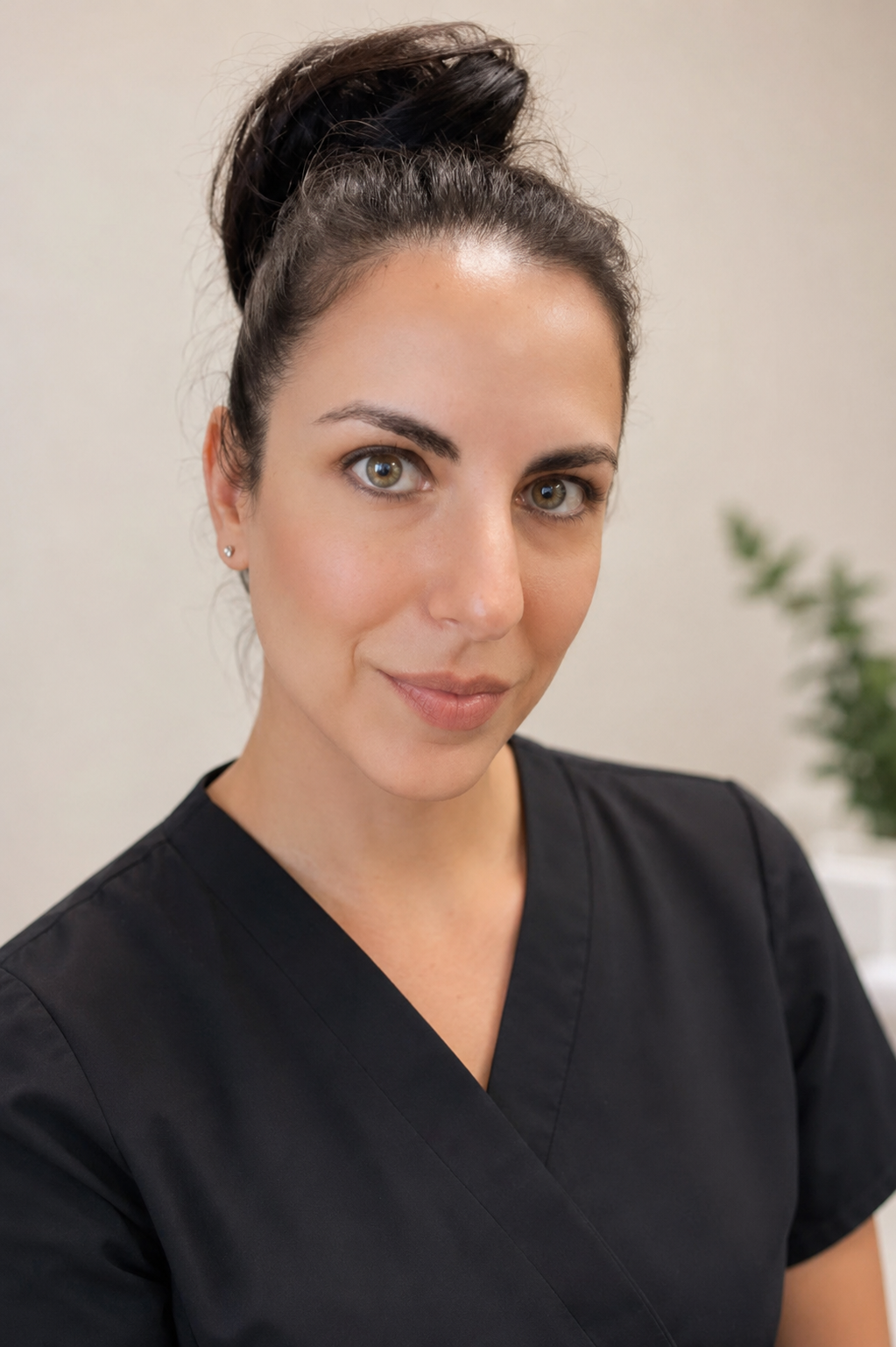 Samantha in her esthetician scrubs